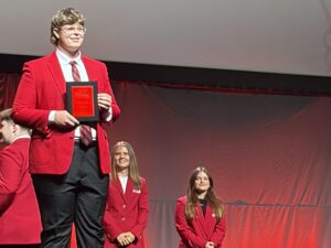 FCCLA student posing with award